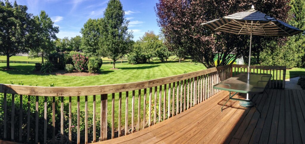 Backyard and deck on a summer day.