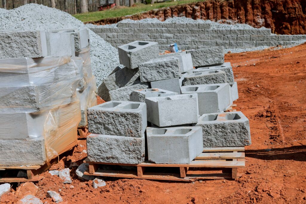 On a newly constructed home, there is retaining wall being built on property adjacent to it